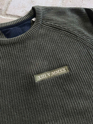 Gebreide trui met romeinse cijfers