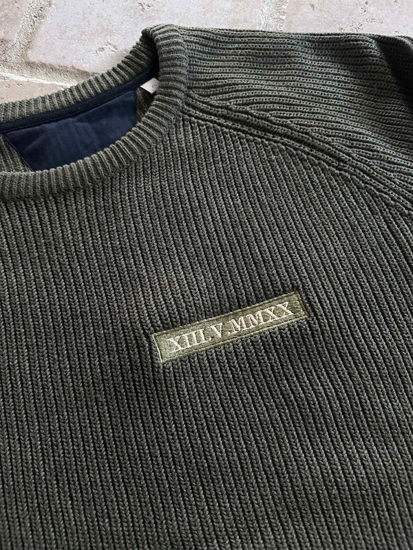 Gebreide trui met romeinse cijfers