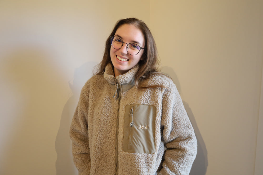 Sherpa jas met initialen