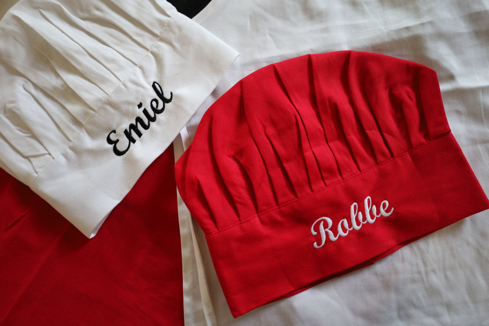 Kinderschort en koksmuts met naam